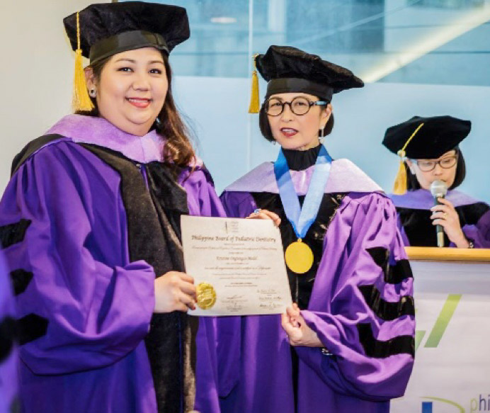 Dr. Kristine Ongtengco-Medel and Dr. Lourdes Caparas